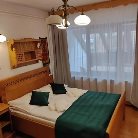 Quarto em Acomodações Particulares Goscinne *
